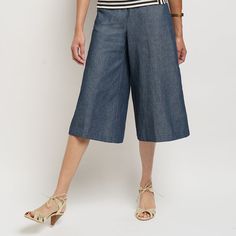 Our denim culottes are a study in proportion: they sit high on the natural waistline, fall below the knees, and have the most flattering wide legs. With every wash and wear, the dark denim will soften more and more. Extra credit goes towards the slant pockets and flat-front waistband with elastic back. Relaxed Fit Medium Wash Wide Leg Pants For Work, Denim Blue Knee-length Bottoms For Spring, Chic Denim Bottoms For Business Casual, Mid-rise Wide Leg Pants For Summer, Chic Dark Wash Knee-length Bottoms, Versatile Medium Wash Bottoms For Day Out, Versatile Wide Leg Spring Capris, Versatile Cropped Leg Bottoms For Spring, Knee-length Denim Summer Pants