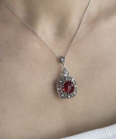 "Ruby Gemstone Silver Gothic Pendant Necklace, 925 Sterling Artisan Made Filigree, Red Ruby Quartz Gemstone Goth Woman Handmade Jewelry Gothic Pendant Necklace, July Pendant Necklace, birthstone necklace, goth women necklace, bridal shower gift, gothic wedding gift Gemstone: Ruby Quartz 12 mm. Ruby is the July birthstone - and it's one of the most coveted of gems. The name is derived from the Latin word ruber, meaning \"red\" - the color of love and passion. Material: 925 Sterling Silver ( NICKE Red Ruby Gemstone Necklaces, Red Ruby Gemstone Necklace, Red Garnet Oval Pendant Necklace, Red Stone Necklaces For Formal Occasions, Red Stone Necklace For Formal Occasions, Formal Red Stone Necklaces, Red Gemstone Crystal Necklace With Round Shape, Red Crystal Necklace For Anniversary, Red Ruby Stone Setting Necklace