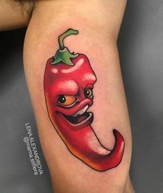 a red hot pepper with a face drawn on it's leg and the word, chili