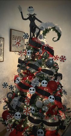 a decorated christmas tree in the shape of a skeleton