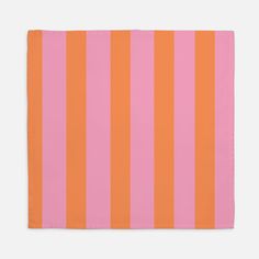 an orange and pink striped towel on a white background