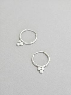 Small hoops earrings, boho, ethnic earrings,sleepers, sterling silver, three dots, triangle dots, dainty hoops, minimalist design These earrings are made from sterling silver and are approx. 2 cm long. They are delicate and easy to wear every day. They do not need an ear back. You pull them to the sides and close them the same way to keep the circle shape. Look at picture 4 and 5) If you like this pair have a look here too: https://www.etsy.com/listing/481865975/small-hoop-earrings-sterling-silv Small Hoops Earrings, Silversmithing Jewelry, Etsy Inspiration, Amazing Finds, Three Dots, Casual Jewelry, Hoops Earrings, Earrings Inspiration, Ethnic Earrings