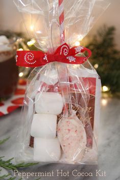 the peppermint hot cocoa kit is wrapped in plastic