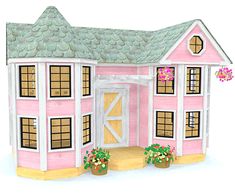 a pink doll house with flowers and potted plants