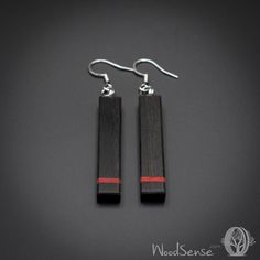 These natural wooden earrings are handmade from Ebony wood with Red Heart wood inlay and stainless steel (hypoallergenic) hooks. The earrings are made to order and made just for you. They are unique, very light and comfortable to wear every day. The entire process to make your earrings is about 3-5 days. -----Sizing----- Length: 45 mm.  Should you wish a different length, please contact me. Thickness: 4 mm Width: 8 mm -----Finish----- The earrings are finished with natural hardwax oil. It gives Making Wooden Earrings, Wooden Dangle Earrings, Wood Jewellery Handmade, Wooden Earrings Studs, Wooden Earrings Handmade, Simple Elegant Jewelry, Wood Earrings Stud, Heart Wood, Earrings Wood