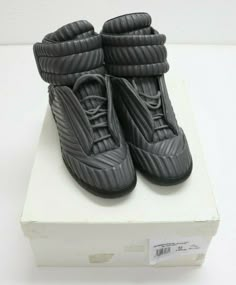 Maison Margiela Future Leather High-Top Sneaker Black/Grey Size US 9, EUR 42 Soles have some dirtiness, but shoes are otherwise in great, undamaged condition. (See pictures for further description) Designer Gray Sneakers With Round Toe, Margiela Future, Hard Shoes, Margiela Replica, Tabi Shoes, Dope Fits, Black Men Street Fashion, Margiela Shoes, Men Street Fashion