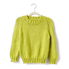 a yellow sweater hanging on a hanger with the top half turned to show it's shoulders