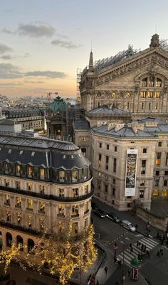 an aerial view of the city at dusk