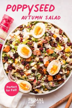 the cover of poppy seed autumn salad with eggs and cranberry sauce on top