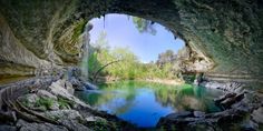 an image of a cave with water in it