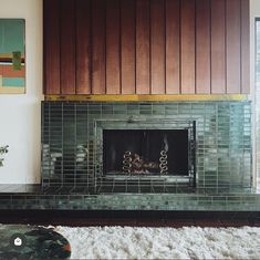 a living room with a fire place in it