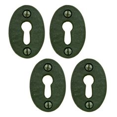 four green metal keyholes with holes in the middle and two on each side