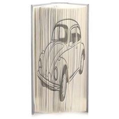 an open book with a drawing of a car on the front and back pages in grey