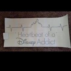 a piece of paper with the words heartbeat of a disney addict on it