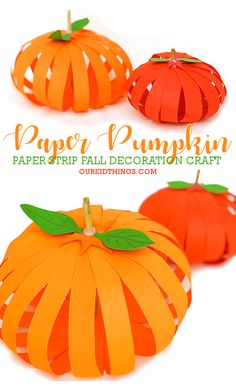 the paper pumpkin is cut out and placed on top of each other