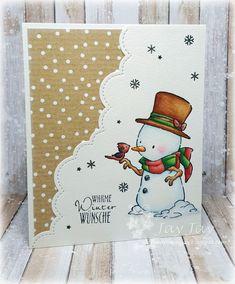 a card with a snowman holding a bird