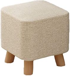 a beige ottoman with wooden legs on a white background