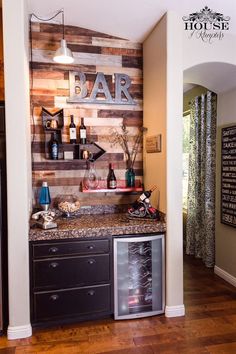 there is a wine rack in the corner of this kitchen