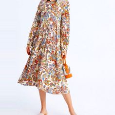 This Is A Beautiful Floral Print Shirt Dress! Brand Name Is Urban Revivo. Made Of 100% Viscose Fabric, Breathable Material. It Has Buttons On The Front And Fits Beautifully. Size Medium. Midi Length Shirt Dress For Fall Vacation, Beige Button-up Midi Dress For Beach, Fall Beach Button-up Midi Dress, Casual Beige Shirt Dress For Spring, Fall Beach Midi Dress With Button-up, Bohemian Fall Shirt Dress, Beige Shirt Dress For Beach Wear In Fall, Beige Shirt Dress For Beach In Fall, Beige Long Sleeve Shirt Dress For Vacation