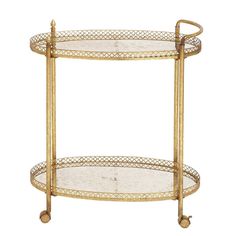 a gold metal and glass serving cart with two shelves on wheels, the top half is empty