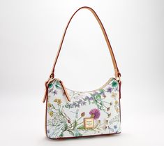 Sleek and sophisticated with a slim silhouette, this botanical baguette blooms with efflorescent style. From Dooney & Bourke. \n\nOriginal item is A641320. This product may be a customer return, vendor sample, or on-air display and is not in its originally manufactured condition. It may not be new. In some instances, these items are repackaged by QVC. Dooney & Bourke, Hobo Handbags, Jewelry Bags, Dooney Bourke, Fashion Handbags, Lookbook, Sleek, Purse, Handbags