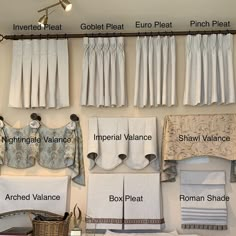 towels hanging on the wall and labeled with different types of valance, roman blinds, roman curtains, roman blind