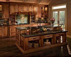 an image of a kitchen with wooden cabinets and granite counter tops on instagrams