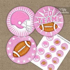 some pink plates with footballs and helmets on them