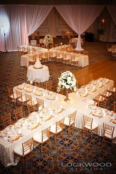 an overhead view of a banquet hall with tables and chairs set up for formal function