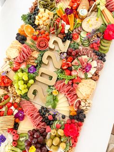 a large number made out of fruits and vegetables