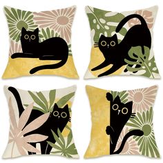 four pillows with black cats and flowers on them