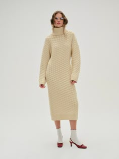 The Milana cream sweater dress offers an irresistably cozy look for winter days and laid back nights. Featuring a chic turtleneck, this cable knit midi dress spotlights classic sweater rib trims. Cream Sweater Dress, Cable Knit Dress, Big Collar, Classic Sweater, Wedding Lingerie, Cream Sweater, Knit Midi, Winter Days, Knit Midi Dress