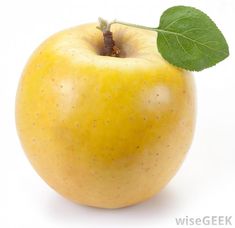 an apple with a green leaf on it's tip, against a white background