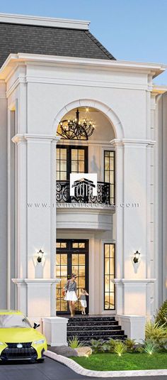 a yellow car is parked in front of a white building with black windows and balconies