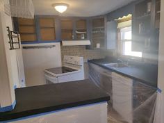 the kitchen is being remodeled and ready to be used as a family room or office