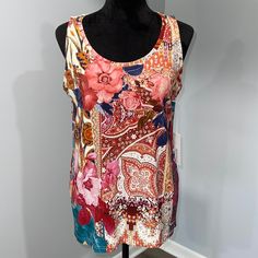 Chico’s Size Medium Touch Of Cool Basic Knit Top Sleeveless Floral Print New With Tags Condition Stretches Well - Rayon Spandex Material Smoke Free Home Spring Multicolor Stretch Vest, Multicolor Stretch Sleeveless Tops, Fitted Floral Print Sleeveless Vest, Red Camisole Tank Top For Spring, Spring Multicolor Stretch Tank Top, Chic Multicolor Sleeveless Blouse Tank Top, Multicolor Fitted Sleeveless Tank Top, Fitted Multicolor Sleeveless Tank Top, Stretch Floral Print Tank Top