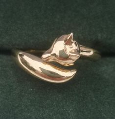 Gold coloured ring twisted with moulded fox mask over tail.It is marked 925 so may be silver with gold plating . In good condition.  Size P ( UK ) 7.5 ( USA ) . New gift box provided. Fox Ring, Fox Mask, Gold Color Ring, Rings Statement, Gold Plating, Labour Day, Statement Rings, Gold Color, Jewelry Rings