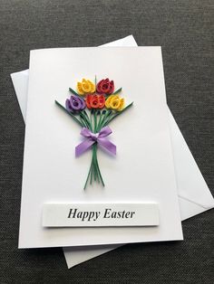 an easter card with colorful flowers on it