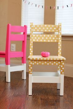 two children's wooden chairs sitting on top of a hard wood floor next to each other