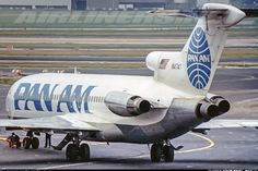 an airplane is parked on the tarmac at an airport