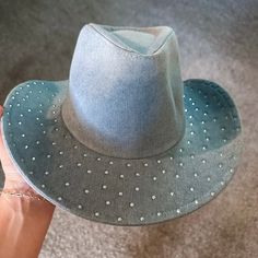 Cubic embellished denim cowboy hat stylish denim pretty cubic decoration perfect hat for the 4th of july and all the summer concerts and rodeos! 100% polyester one size fits most Summer Hats With Rhinestones And Short Brim, Trendy Summer Hats With Rhinestones, Trendy Hats For Country Concerts In Summer, Trendy Hats For Summer Country Concerts, Trendy Summer Hats For Country Concerts, Casual Summer Hats For Country Concerts, Trendy Blue Hat For Rodeo, Country Style Summer Hats For Country Concerts, Summer Fedora For Country Concerts