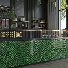 a green tiled counter in a coffee shop