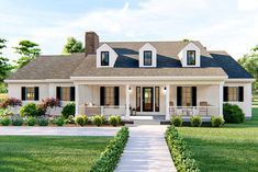 a white house with black shutters on the front porch and two story entryway