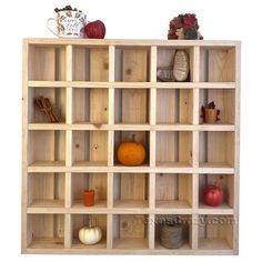 a wooden shelf filled with lots of different types of items