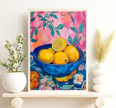 a painting of lemons in a blue bowl on a shelf next to a vase with flowers