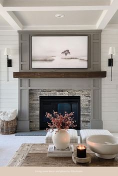 the living room is clean and ready for us to use it's fireplace as a focal point