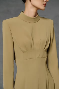 Elegant Beige Dress With Pleated Bodice, Classic Dresses With Pleated Fitted Bodice, Classic Pleated Dress With Fitted Bodice, Classic Dress With Pleated Detail And Fitted Bodice, Classic A-line Dress With Pleated Back, Elegant A-line Midi Dress With Pleated Sleeves, Elegant Beige Midi Dress With Pleated Bodice, Elegant Fall Dress With Pleated Back, Classic Pleated Solid Color Dresses