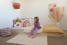 Montessori inspired floor bed made in Canada.  MATERIAL Made out of high quality Canadian pine wood. Each piece is hand selected from the lumber yard and hand sanded to a smooth finish. All edges are beveled. Hardware included.  Slats are included and sit roughly 2" off the floor. LEGS Adding a set of legs are optional with this frame and can be added later when your little one has outgrown the floor frame. To have a set of legs and hardware included with your frame choose that option in the dro Floor Bed Without Frame, Infant Floor Bed Montessori, Toddler Mattress On Floor, Kids Floor Bed Ideas, Floor Sleeping Bedroom Ideas, Floor Bed Ideas Small Spaces, Toddler Bed On Floor Ideas, Bed Without Frame On Floor, Crib Floor Bed