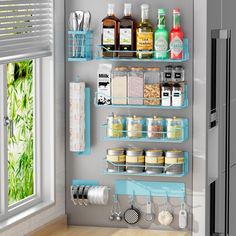 an organized pantry with blue shelves and hanging utensils on the wall next to a window