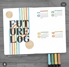 a notebook with the word future log written on it and colored pencils next to it